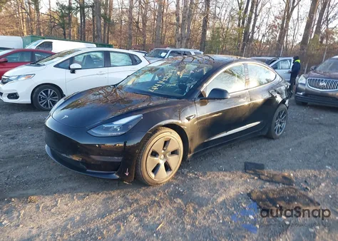 2021 Tesla Model 3 Standard Range Plus Rear-Wheel Drive from USA, damaged, VIN 5YJ3E1EA7MF090339